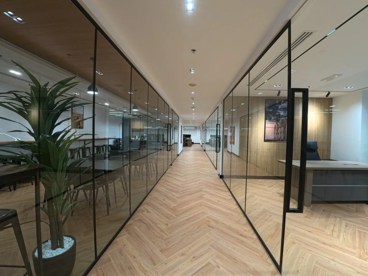 Ad Tyres office cabins with glass partitions executed by Atech Interiors LLC